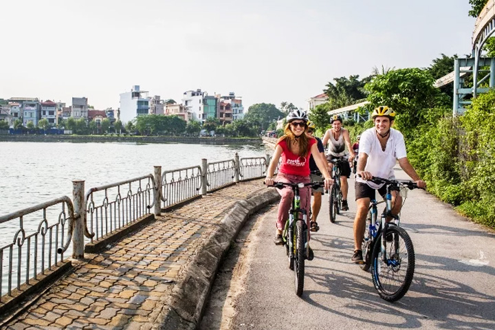 Cycling around Westlake Hanoi before nightlife